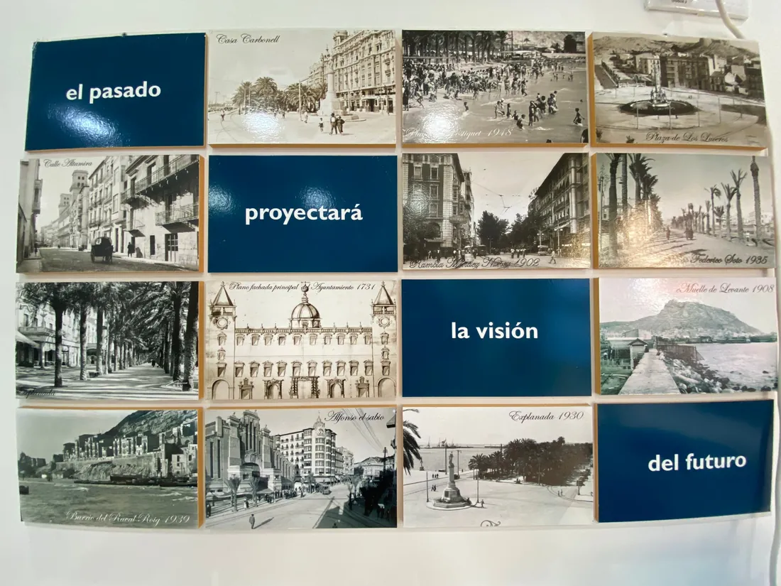 Mural de fotografías históricas de Alicante en la oficina de Wereal Grupo Inmobiliario